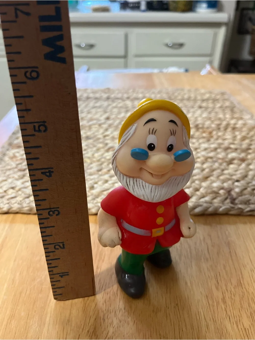 Disney Doc Figurine in Red Coat and Yellow Hat